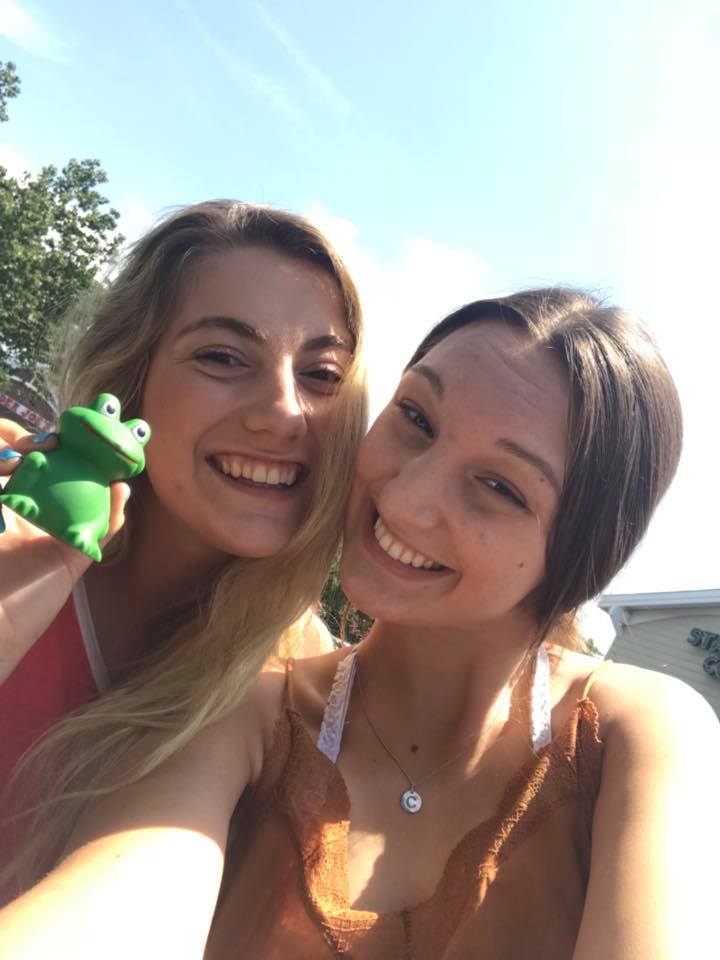Girls with a Bullfrog Toy